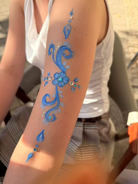 Blue swirls and sparkling arm art