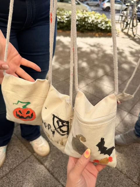 A group of finished Halloween shoulder bags