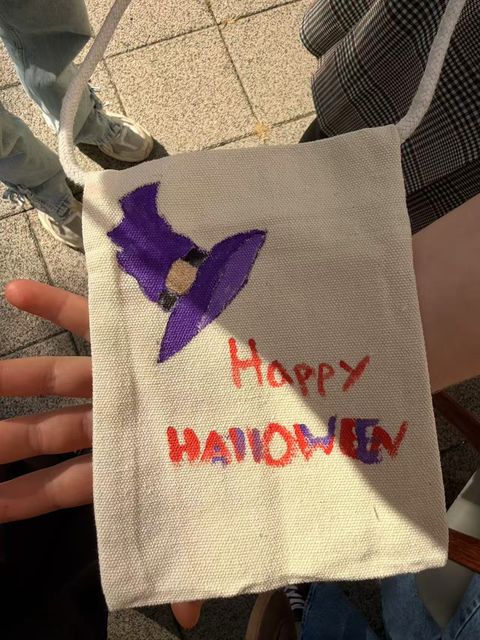 Purple witch's hat on a Halloween tote bag